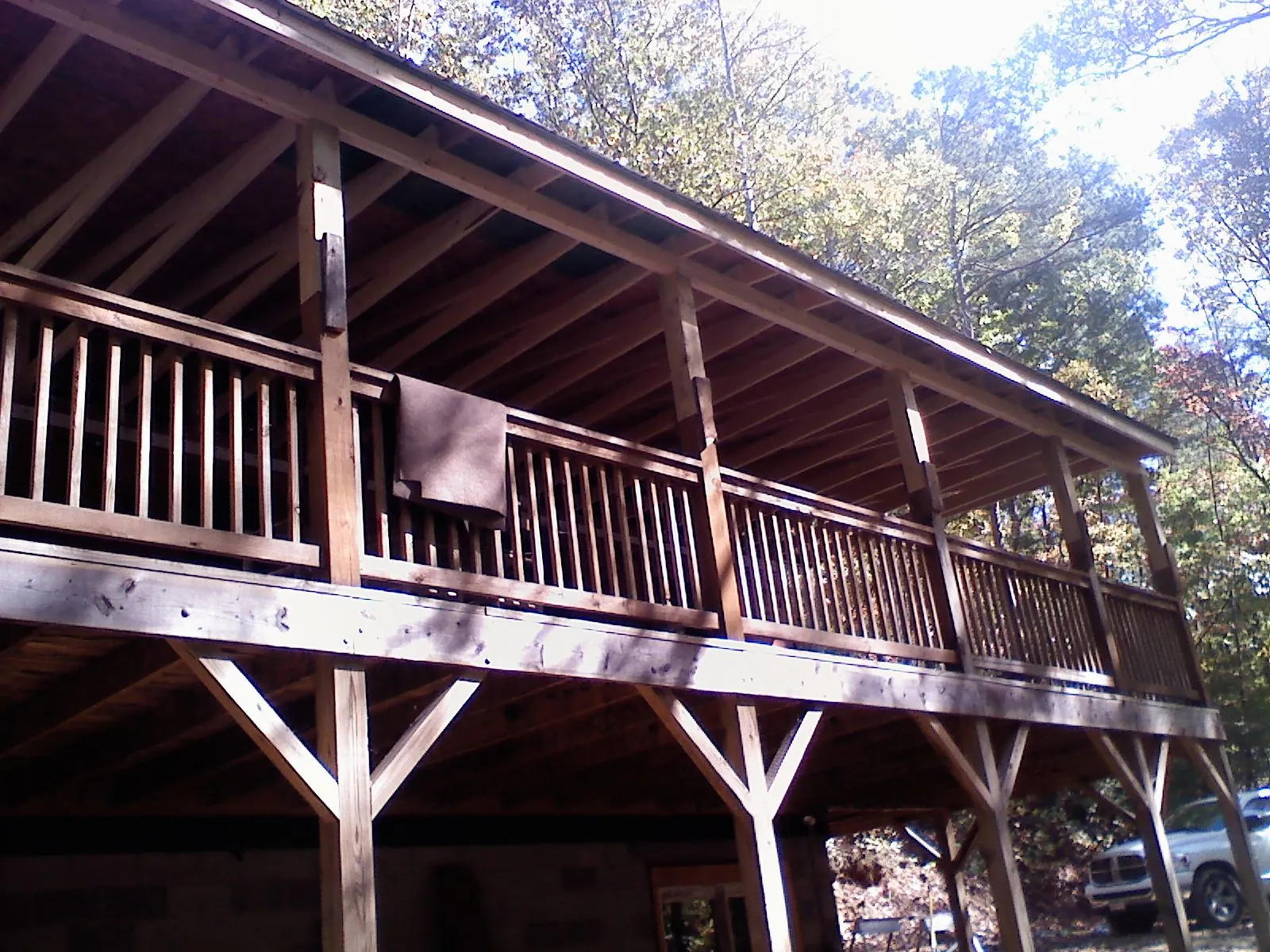 Timber framing under a new elevated porch and deck — Roof Leak Repair in Croton Falls by Roofing Brothers